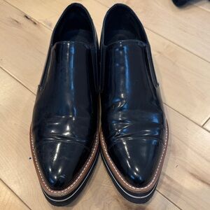 Vince Black Patent Slip-On Loafers with Brown Trim